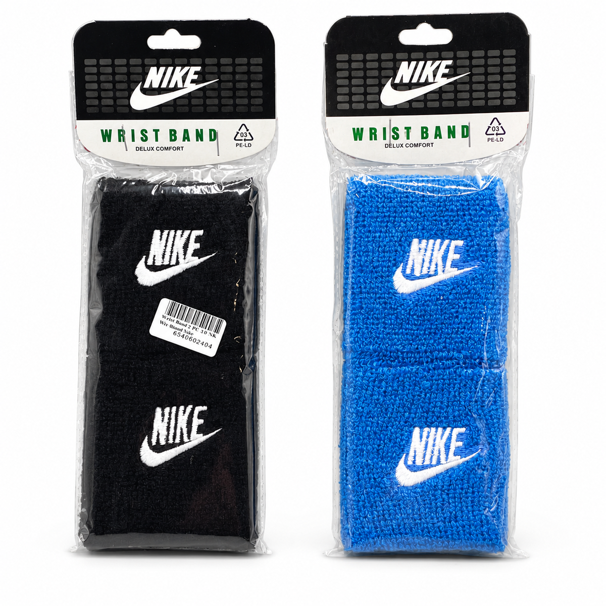 Nike wrist bands in black and blue retail packaging