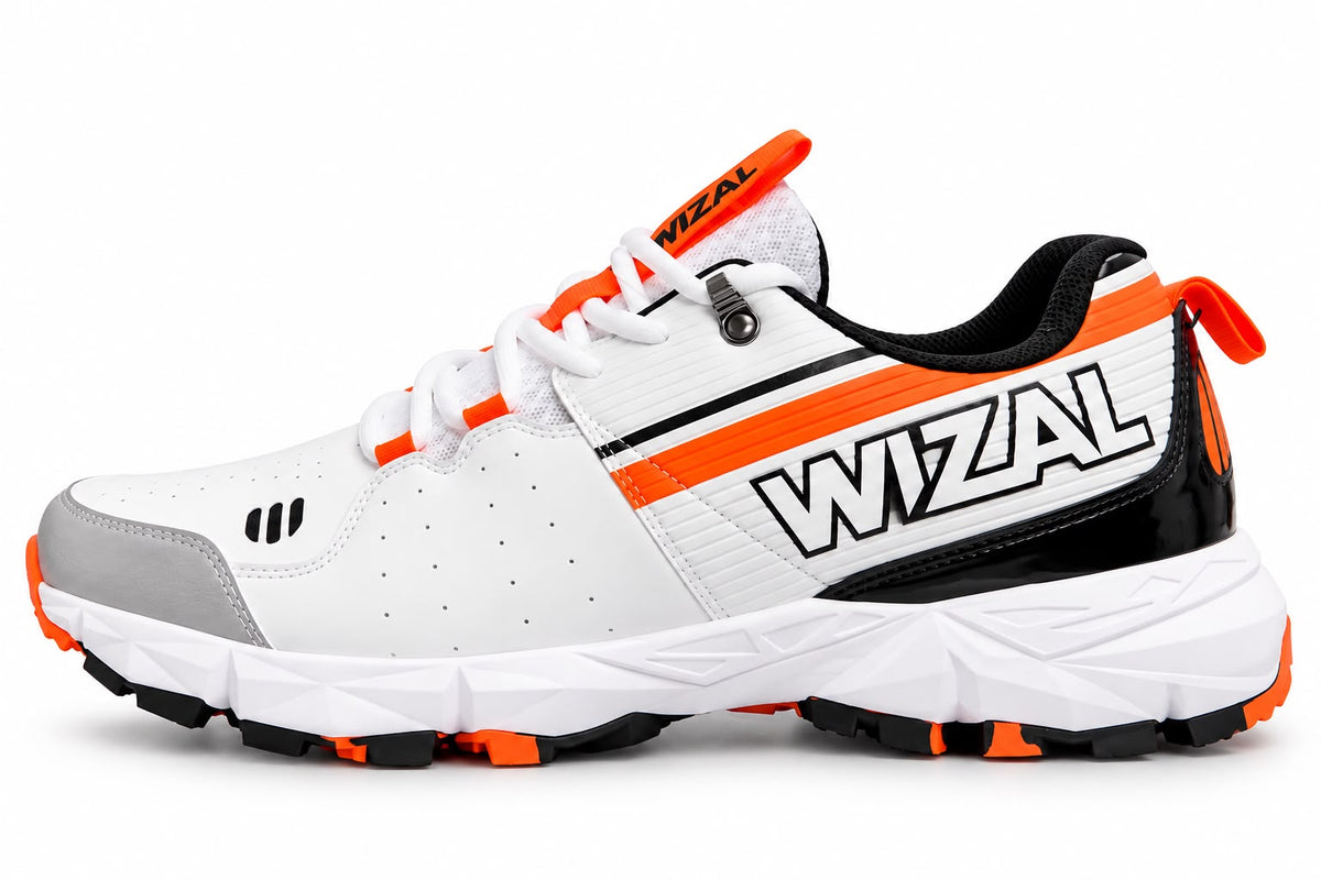 WIZAL white cricket shoes with orange and black detailing side view